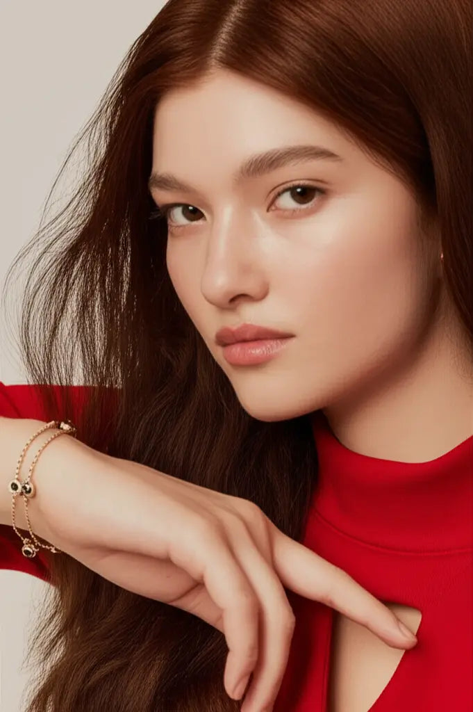 Woman wearing a red top with a neutral background