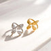 Two gold and silver rings on a light background
