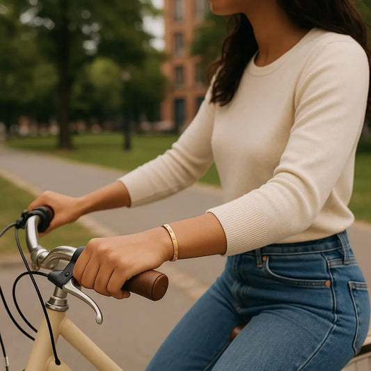 Person riding a bicycle in a park-like setting