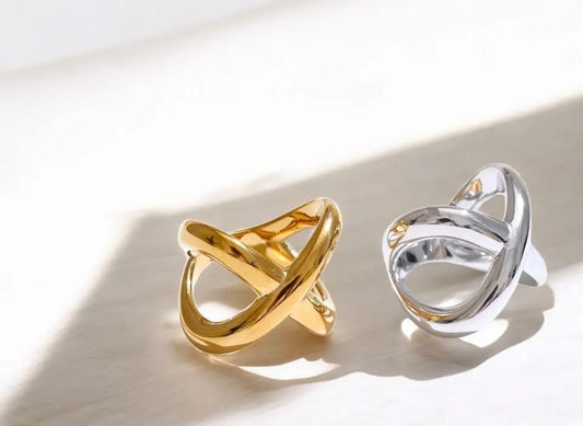 Gold and silver rings on a light background