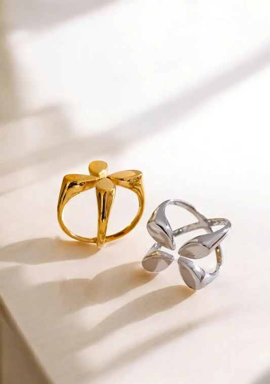 Gold and silver rings on a light background