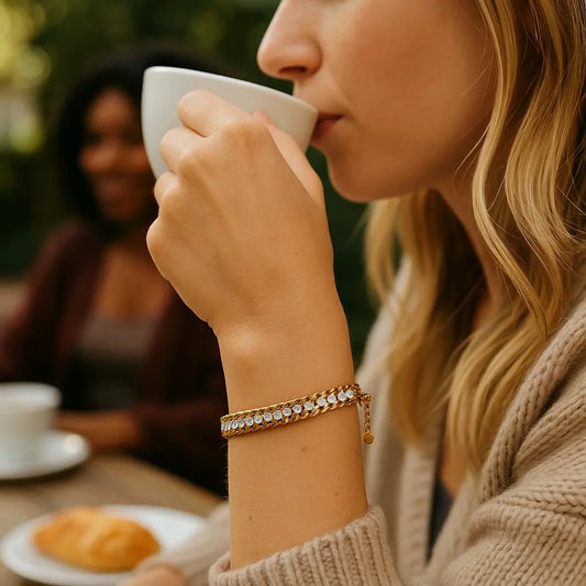 Woman drinking from a white mug with a blurred background