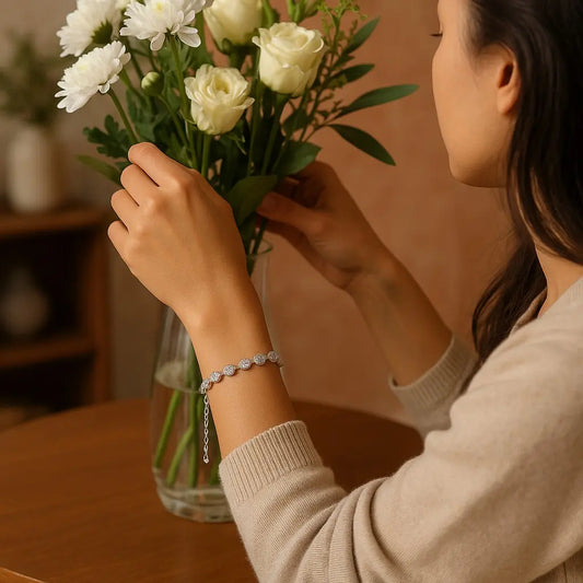 Woman holding a bouquet of white flowers with a blurred background