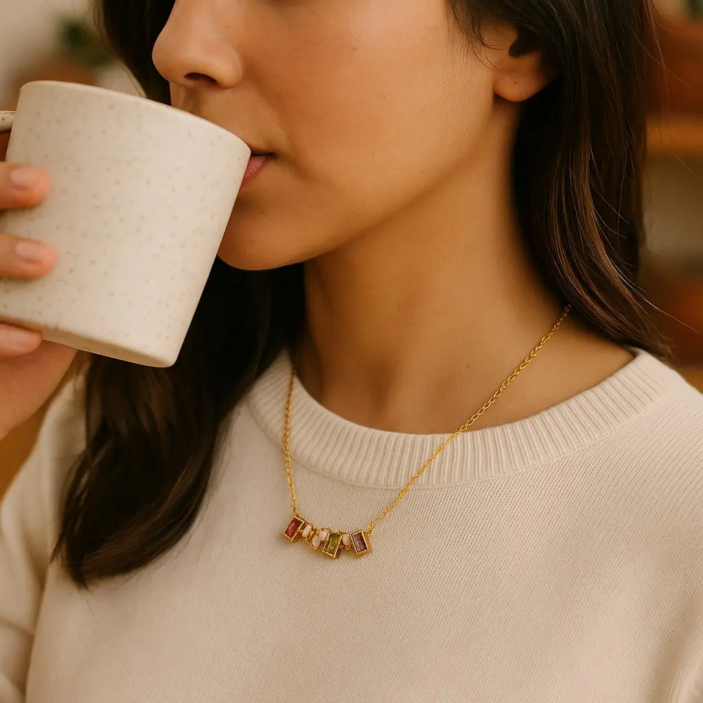 Woman drinking from a white mug with a blurred background